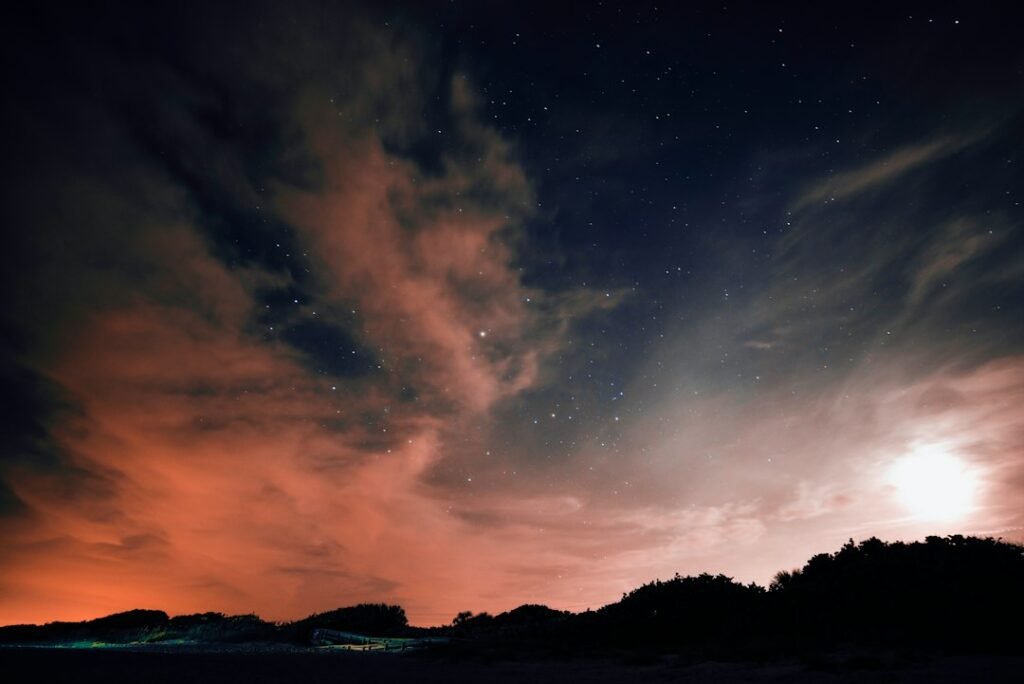 Peaceful moonlit night sky with stars