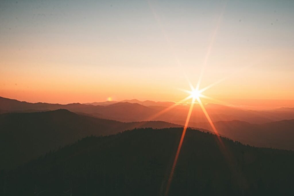 Sunlit mountain landscape symbolizing hope and inspiration