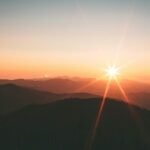 Sunlit mountain landscape symbolizing hope and inspiration